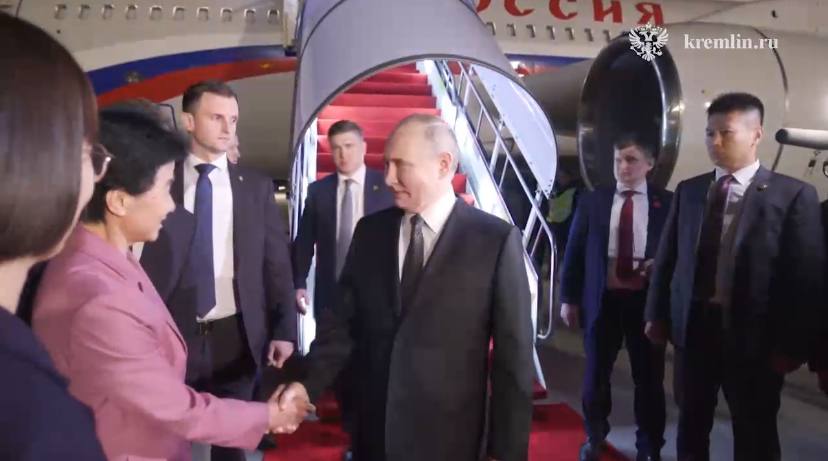 Путин прилетел в Харбин