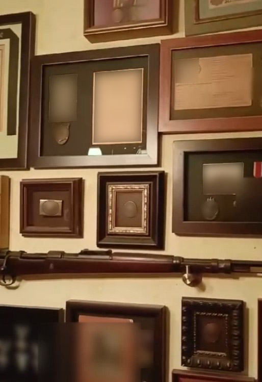 В квартире на Каменноостровском после стрельбы нашли оружие и фашистскую символику